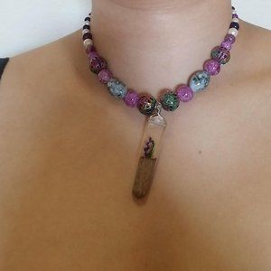 handmade necklace with semi precious stones and flower pendent